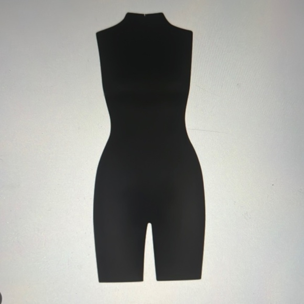 SKIMS ALL-IN-ONE SHINE MOCK NECK
MID THIGH ONESIE - Picture 7 of 7